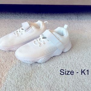 White cheerleading sneakers. Size 1